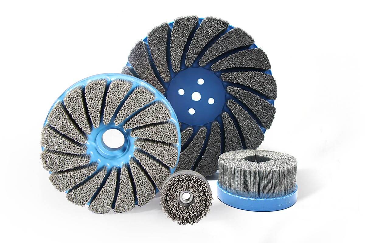 Custom-made brush discs, ideal for surface preparation, cleaning and finishing applications | KOTI Europe